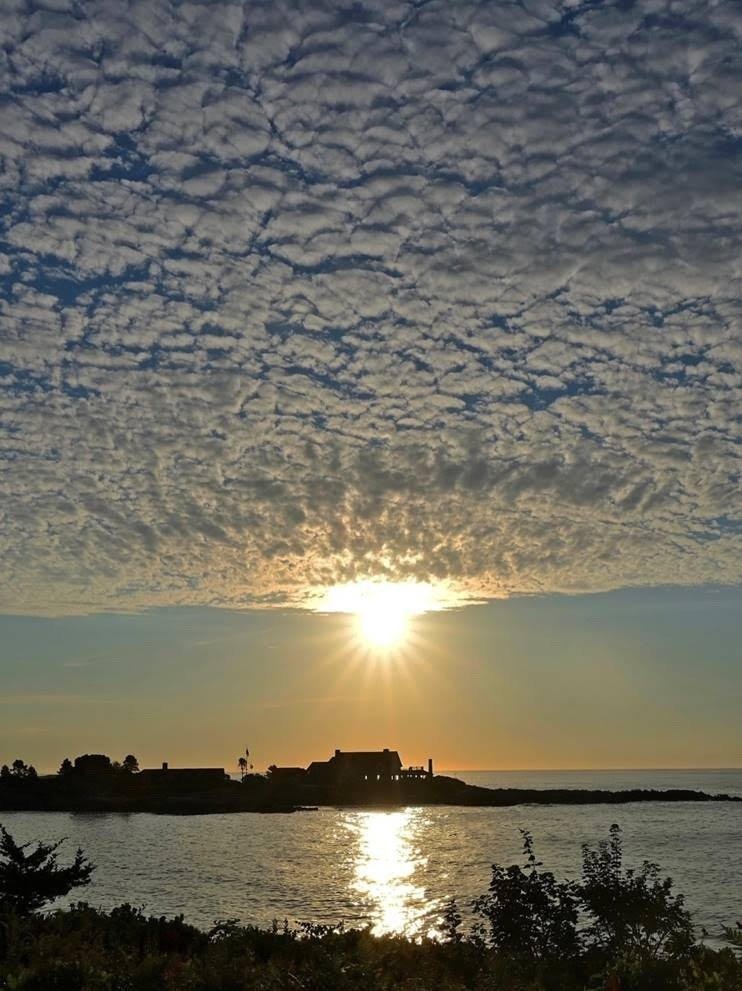 The Sun Rising over Walker’s Point: Photo by Robert Dennis